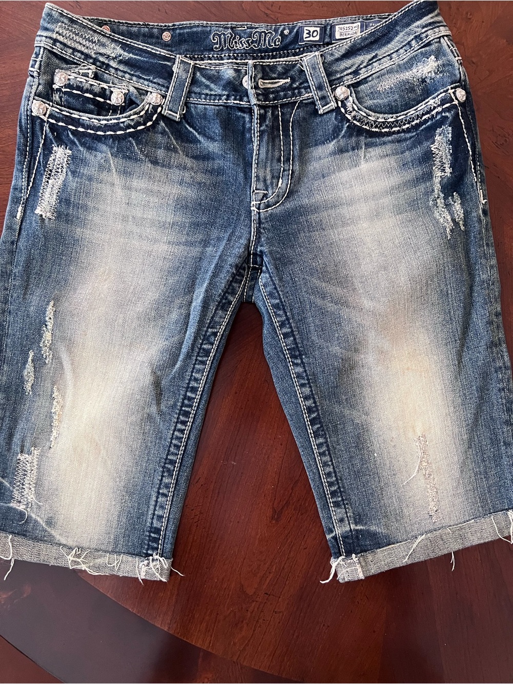 Miss Me Faded Distressed Denim Bermuda Shorts in Blue